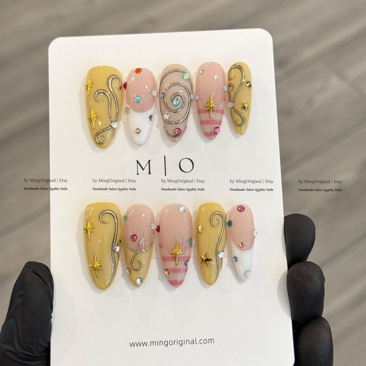Pastel Celestial Press-On Nails – Handmade Yellow & Pink Swirl Nails with Crystal Charms and Star Accents