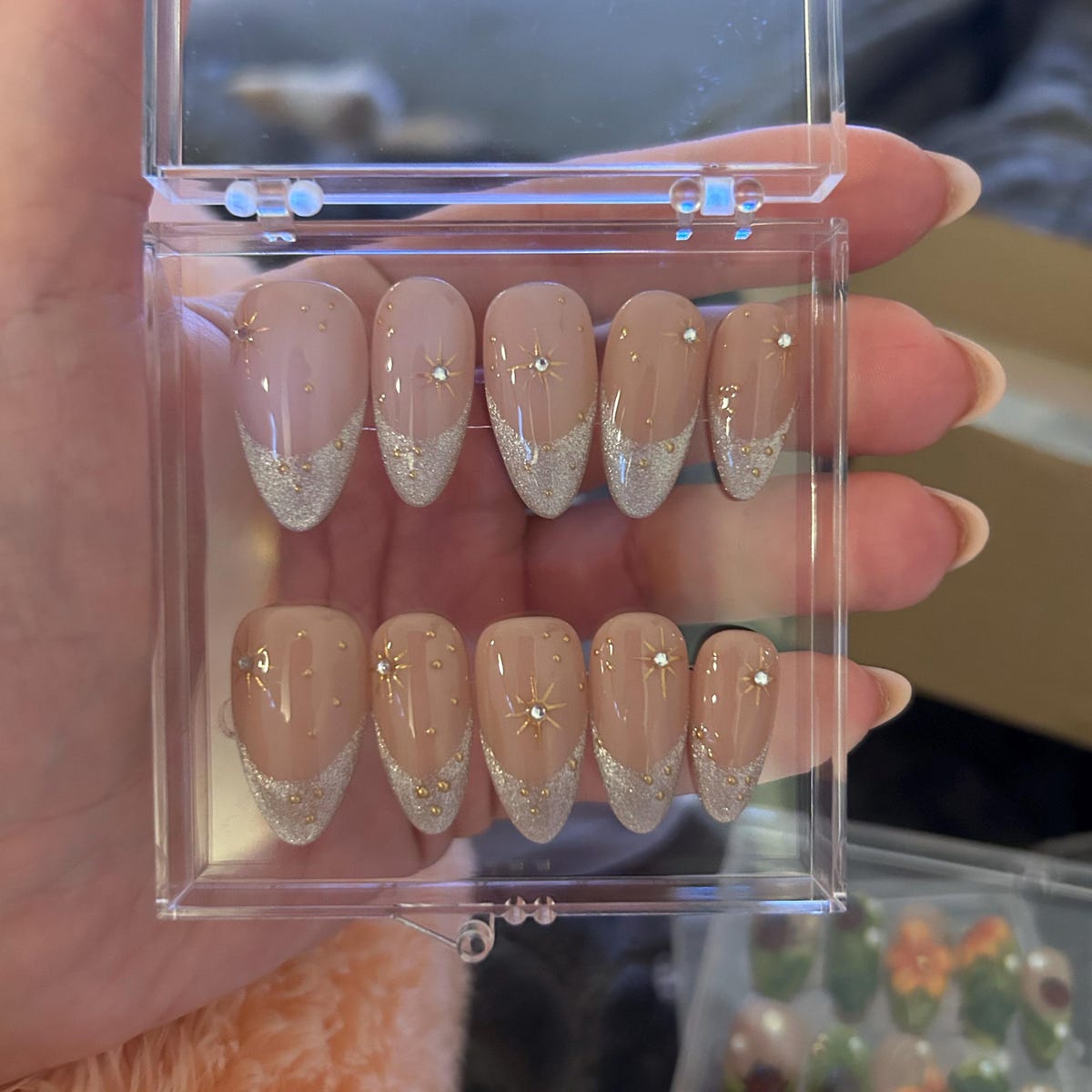 Luxury Nude Gold French Tip Press-On Nails with Starburst Rhinestone Design – Almond Shape Reusable Nail Set
