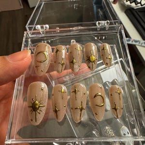 Celestial Gold Star Press-On Nails – Nude Shimmer Moon & Sun Nail Set | Elegant Almond Fake Nails | Handmade Reusable Nail Art