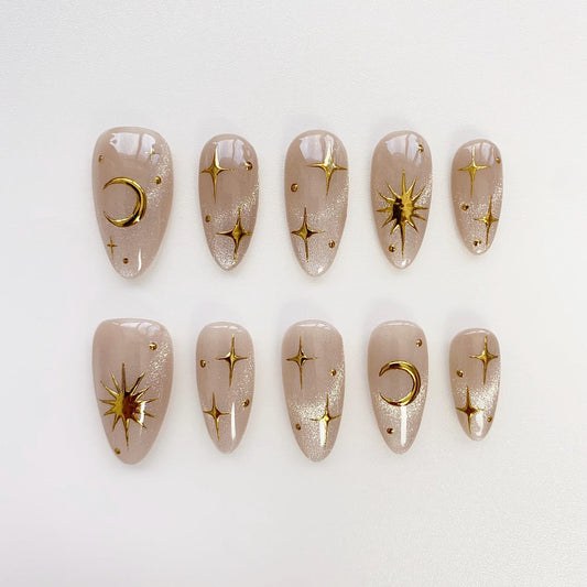 Celestial Gold Star Press-On Nails – Nude Shimmer Moon & Sun Nail Set | Elegant Almond Fake Nails | Handmade Reusable Nail Art